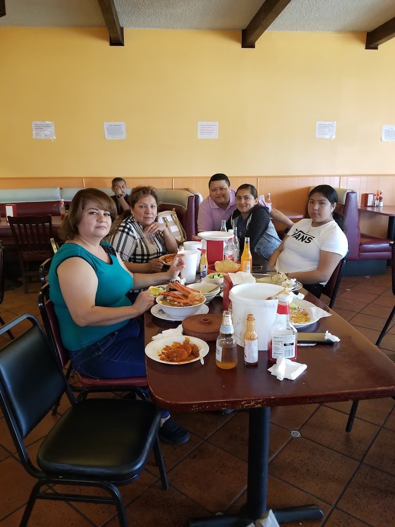 Bright mariscos dishes served family-style.