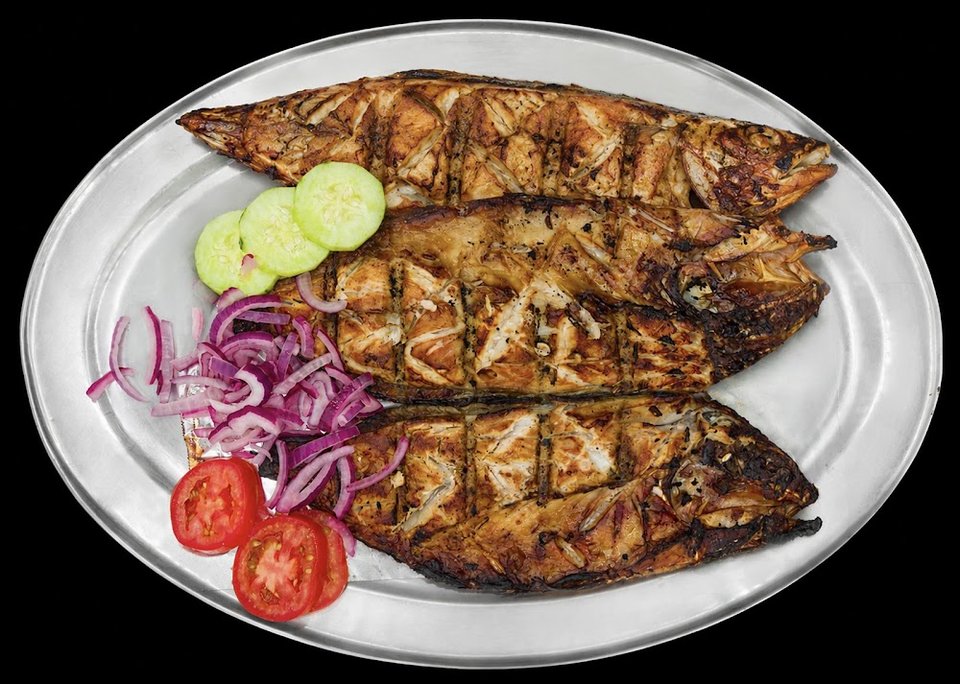 Restaurant menu showing coastal Mexican specialties.
